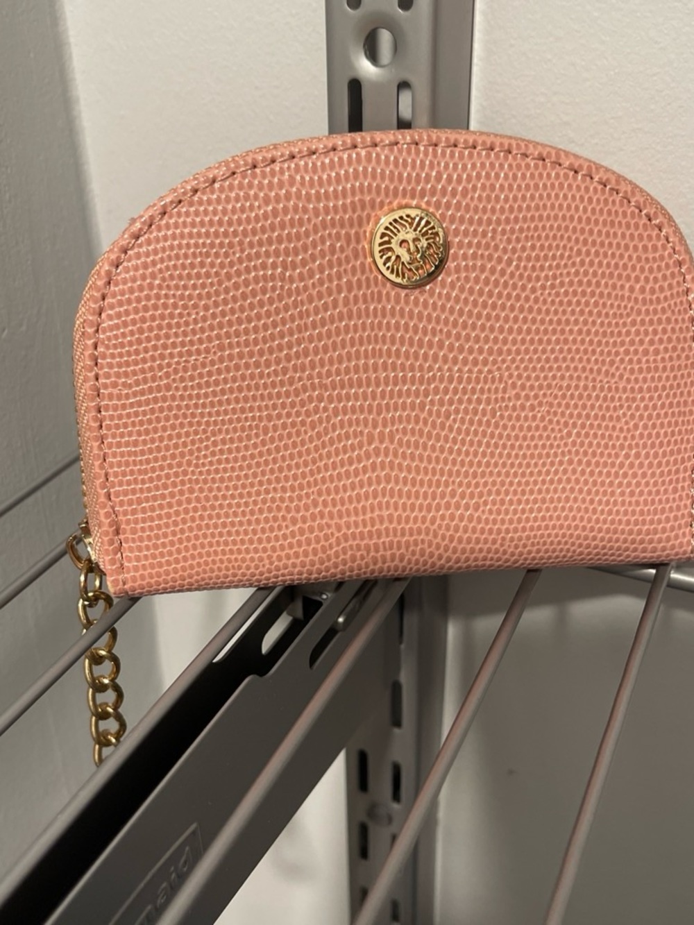 Anne Klein Blush Pink Lizard-Texture Wristlet with Gold Lion Medallion